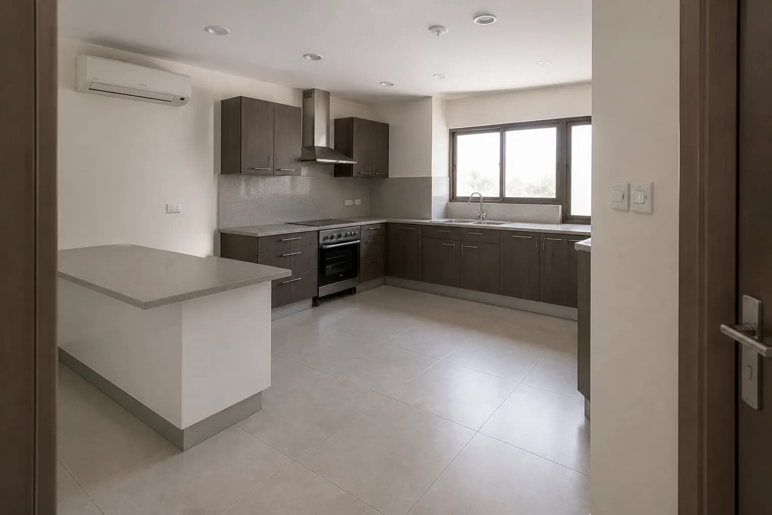 Kitchen of an apartment in Al Reef